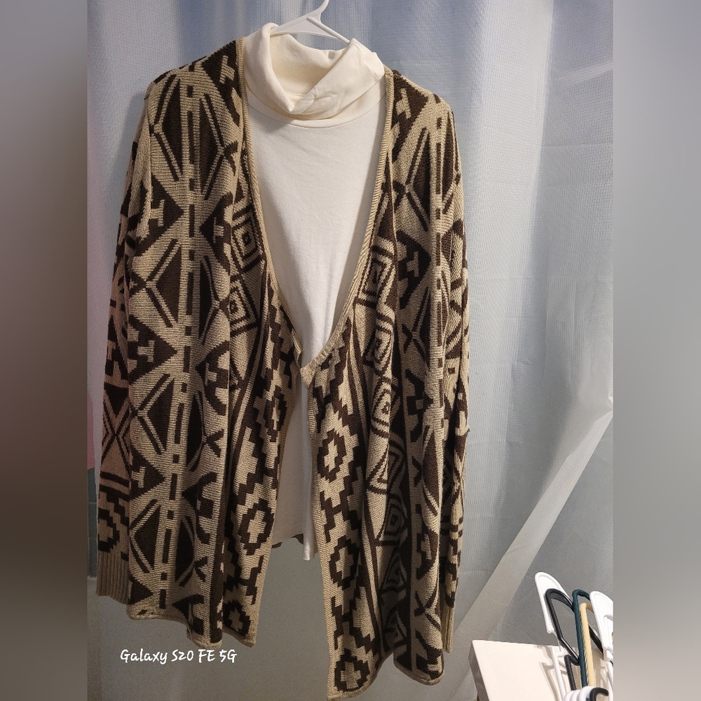 A two piece, a turtle neck long-sleeved and a sweater pull over